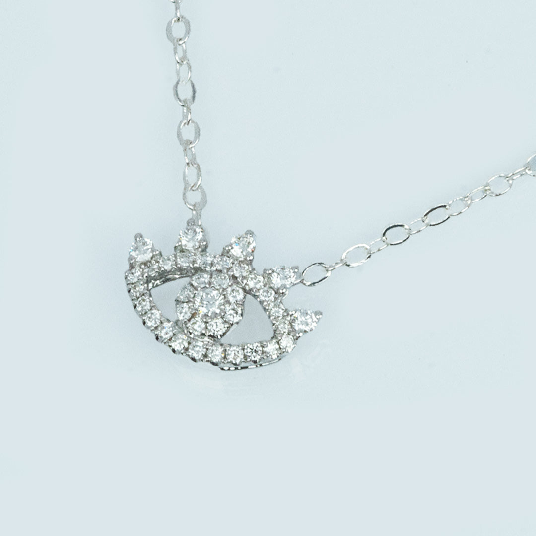 18 carat white gold diamond evil eye pendant