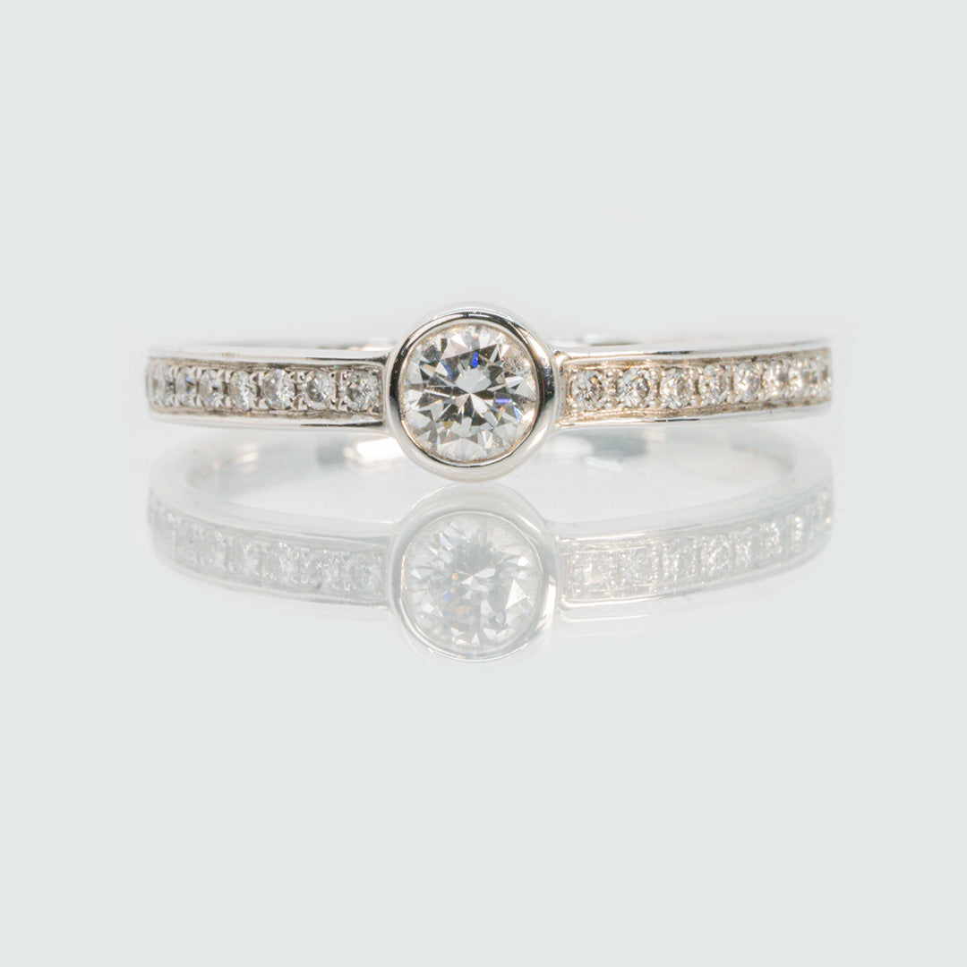 18 carat white gold bezel set diamond engagement ring