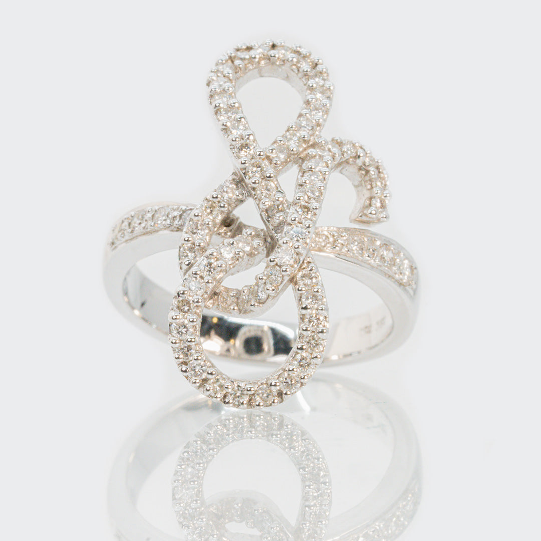18 carat white gold and diamond swirl ring
