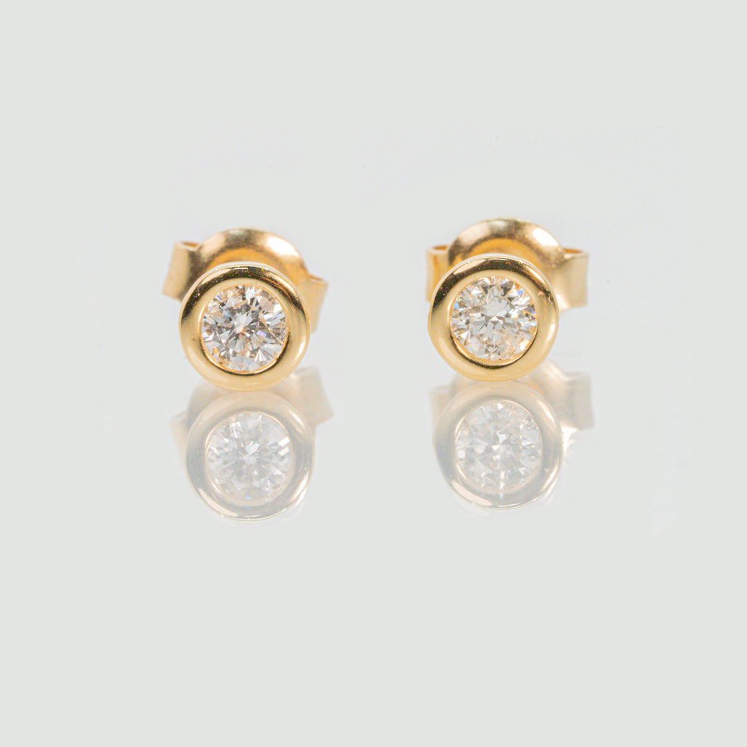 18 carat yellow gold diamond bezel set studs