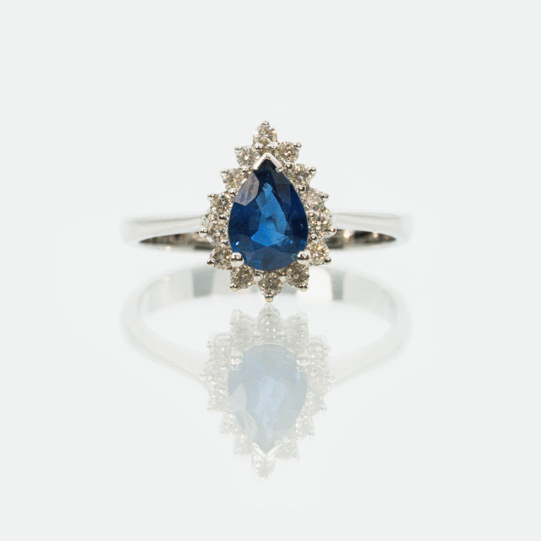 18 carat white gold sapphire and diamond dress ring pear sapphire with halo of diamonds