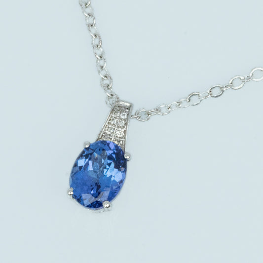 9 carat white gold diamond and tanzanite pendant