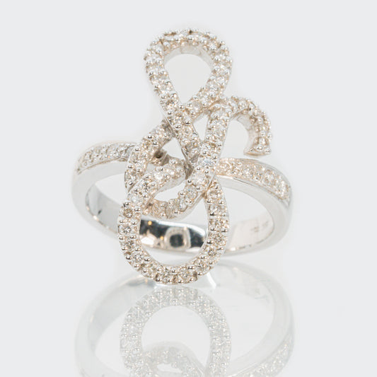 18 carat white gold and diamond swirl ring