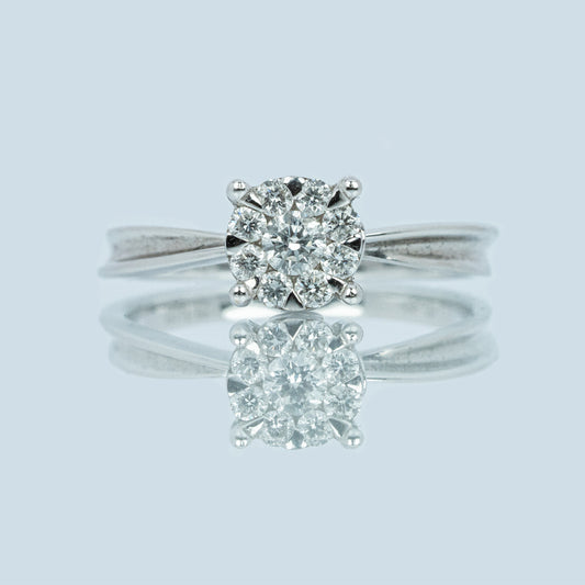 18 carat white gold diamond engagement ring with cluster setting