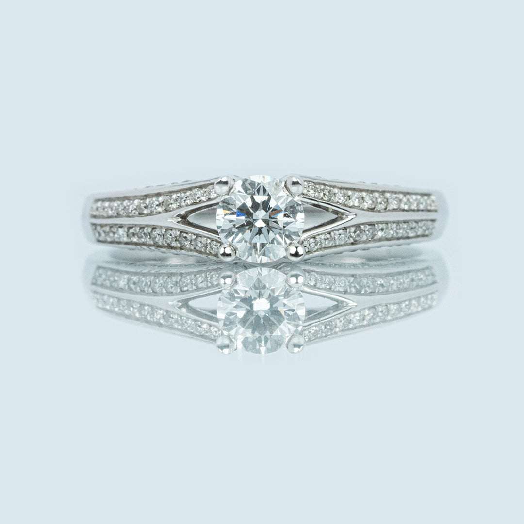 18 carat white gold and diamond split shank ring