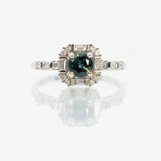 18 carat white gold diamond and green sapphire dress ring