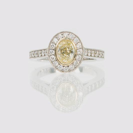 18 carat white gold and yellow and white diamond ring
