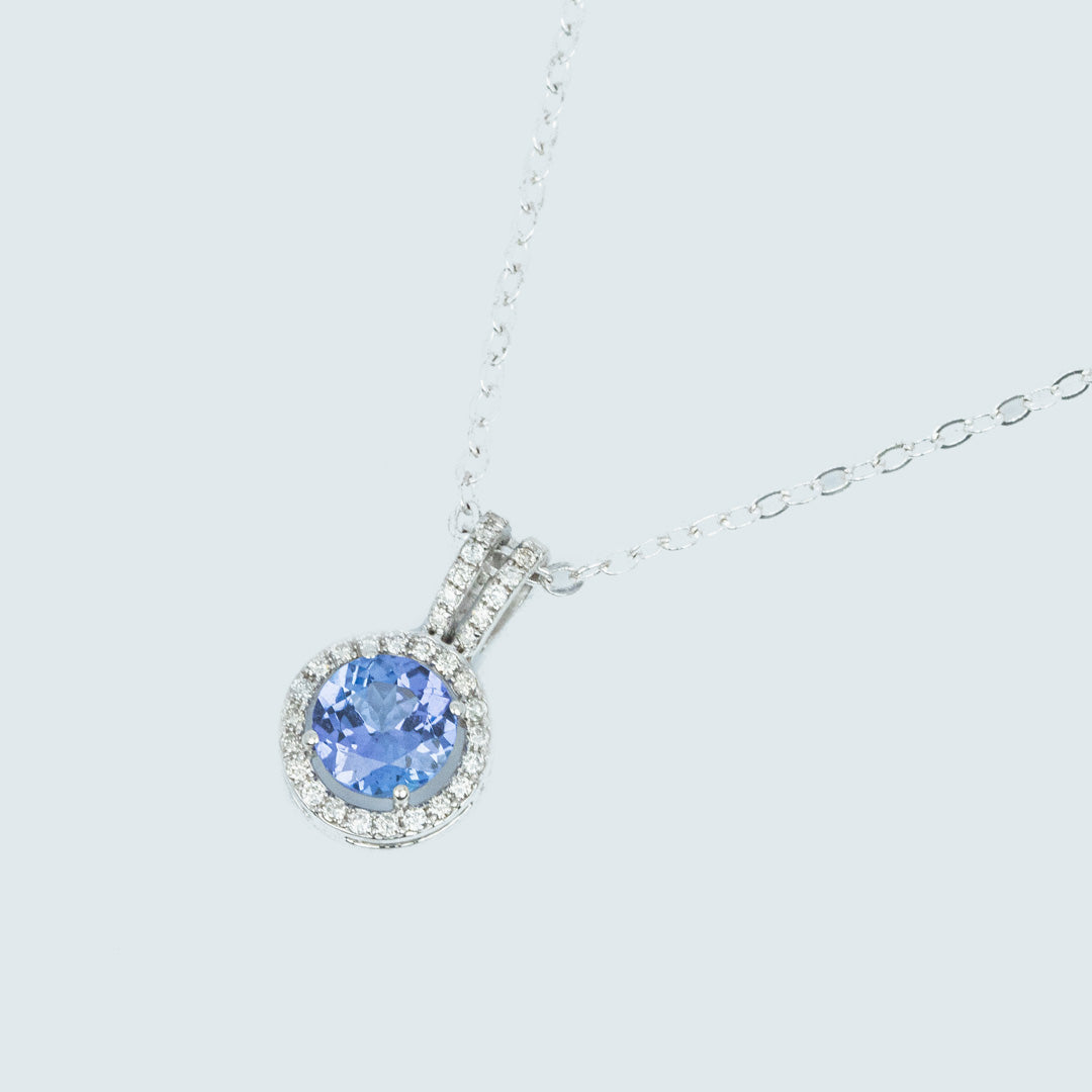 9 carat white gold tanzanite and diamond pendant